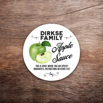 Customizable apple label featuring watercolor green apple graphics on a white background with black text. This photo shows a round label. All text on the label is customizable.